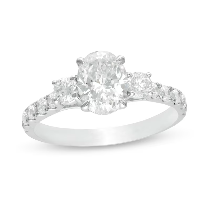 1-3/4 CT. T.W. Oval and Round Diamond Three Stone Engagement Ring in 14K White Gold