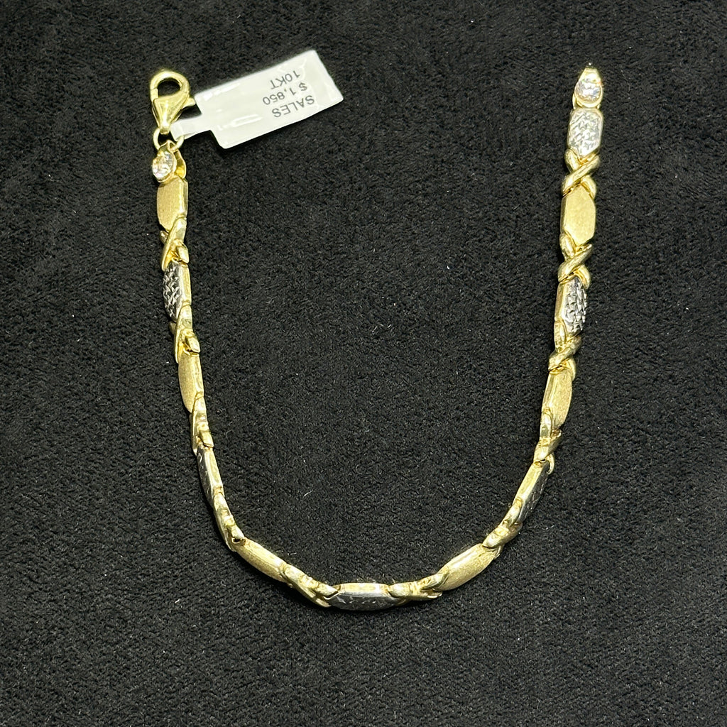 XO Bracelet 10k Gold Fancy Diamond Cut Woman