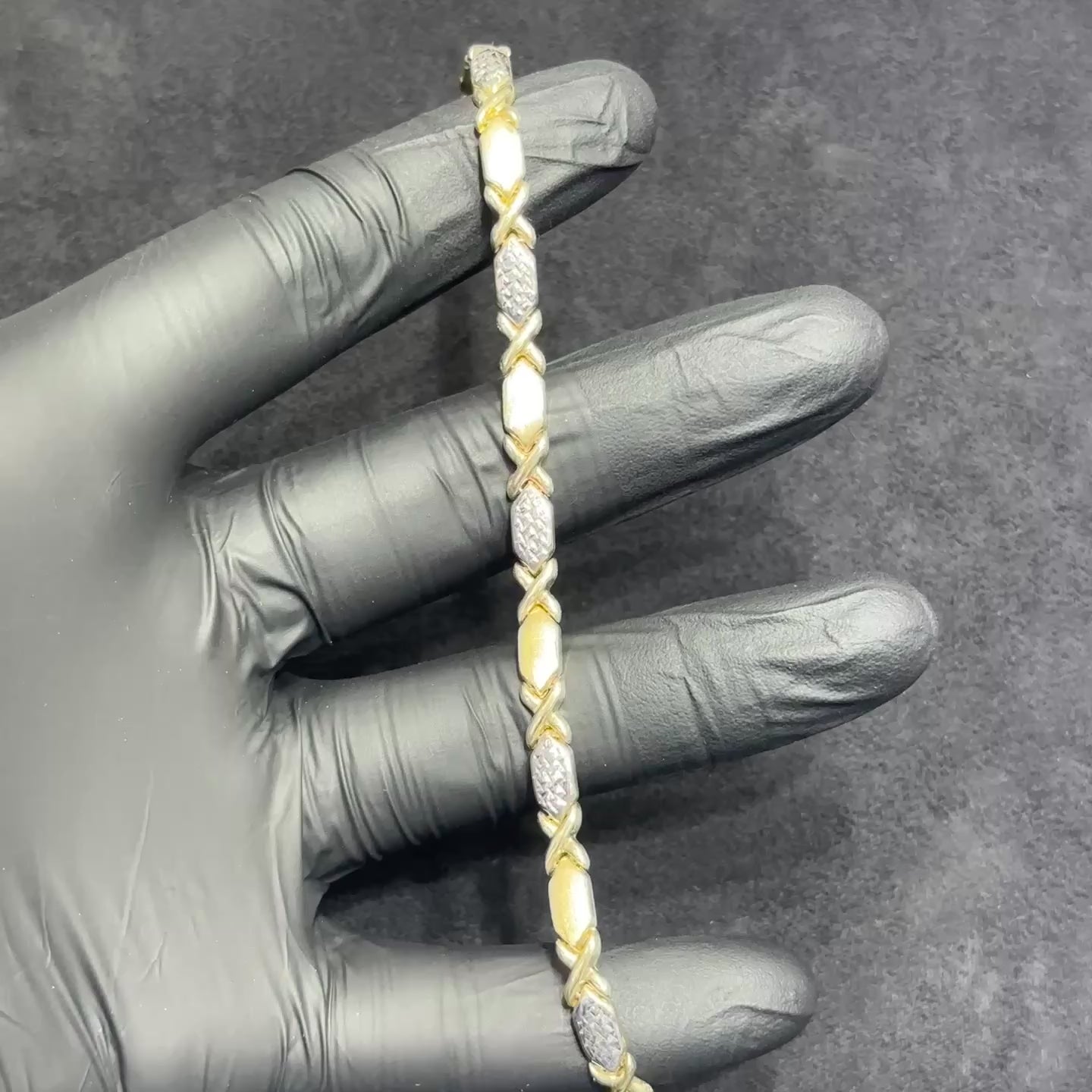 XO Bracelet 10k Gold Fancy Diamond Cut Woman